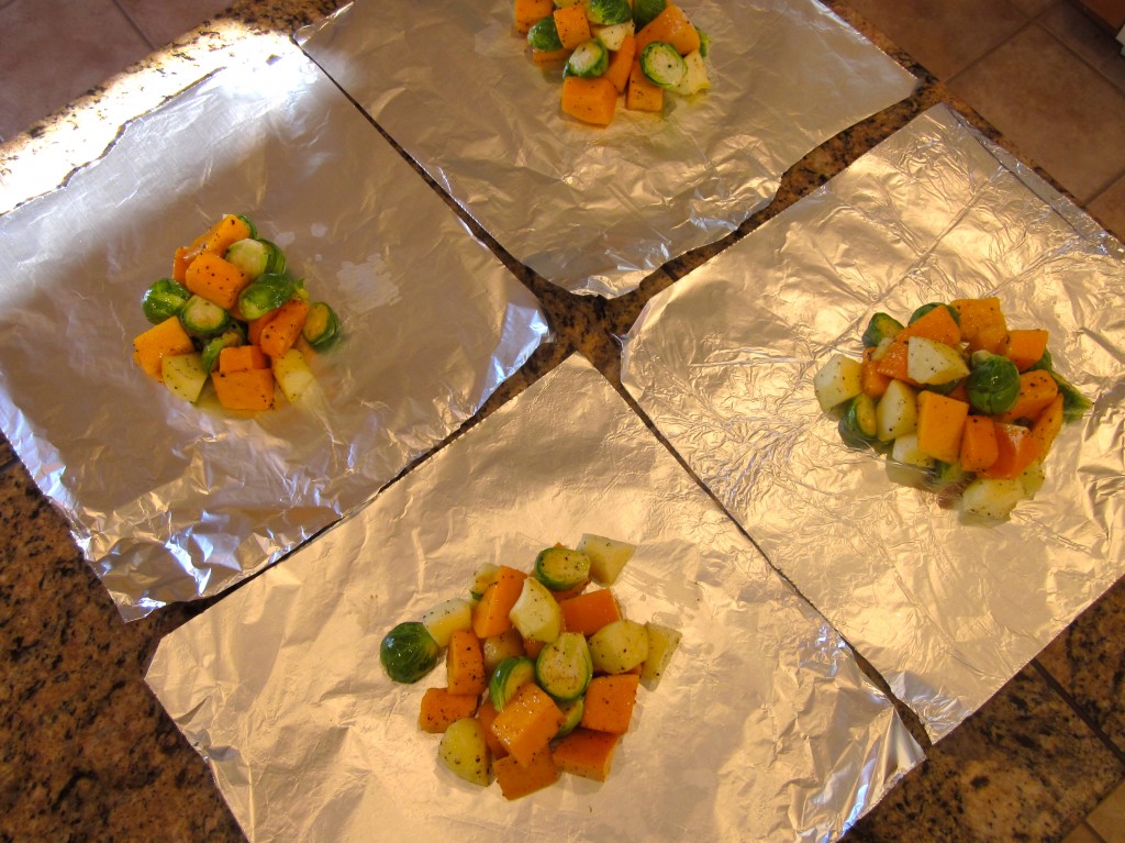 Divide evenly between four non-stick, 12-inch squares of aluminum foil.