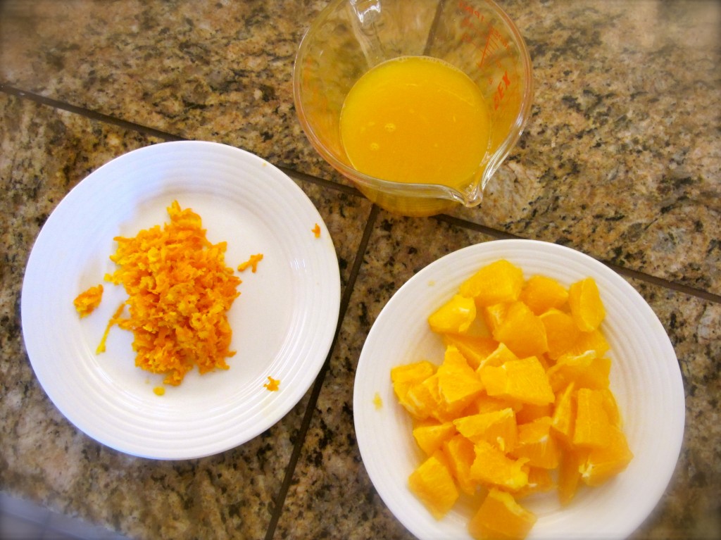 A vision of orange: juice, zest and segments.