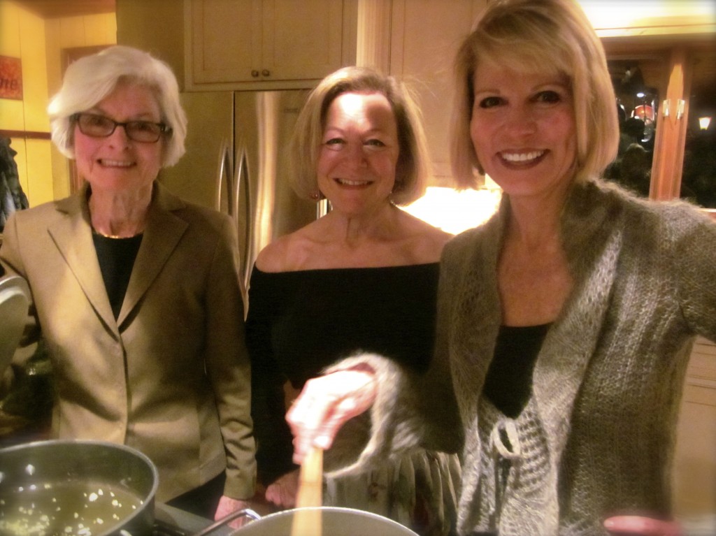 Admittedly, my friends would rather cook than pose but they indulge me for the sake of FFWD. Charlotte (l),  is smiling but  worried about her garlic burning (it didn't). DonnaG (middle),  the hostess, helped me make the dessert. DonnaC, (r),  task was to add the panache . That lady worked wonders with raspberry coulis.   