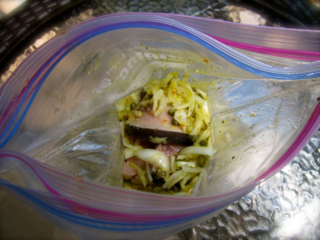 To marinate the swordfish steaks, use  a plastic bag and refrigerate for an hour (or, four).