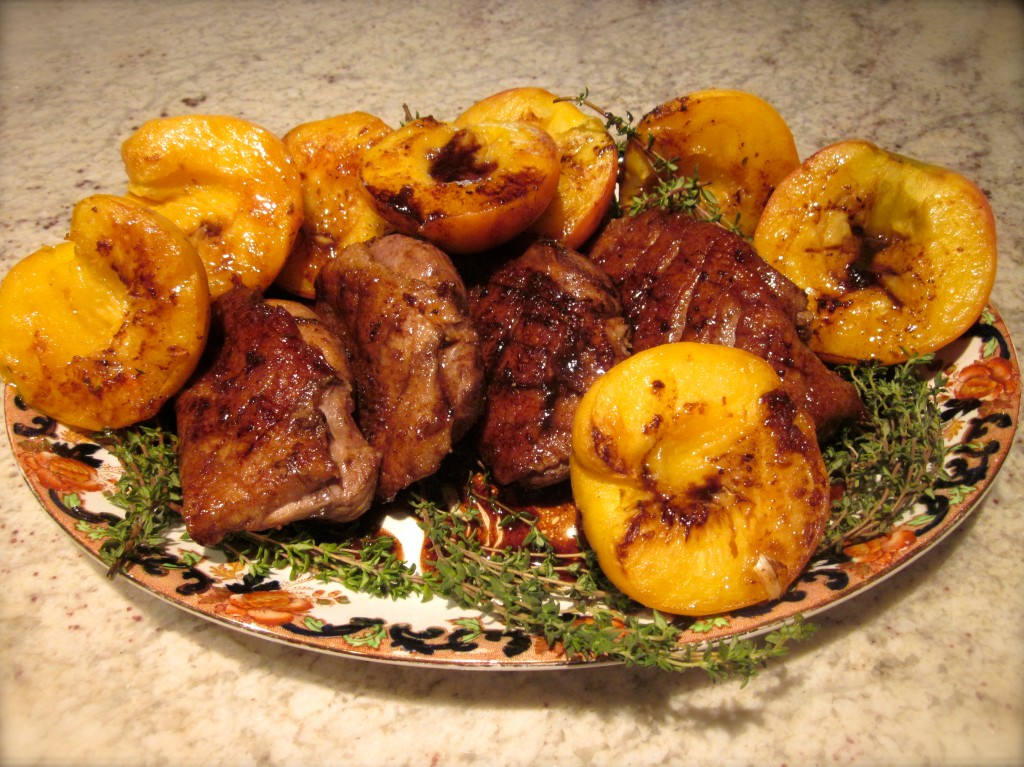 Dazzling duck breasts with fresh roasted peaches, both doused in a balsamic, honey and port sauce 