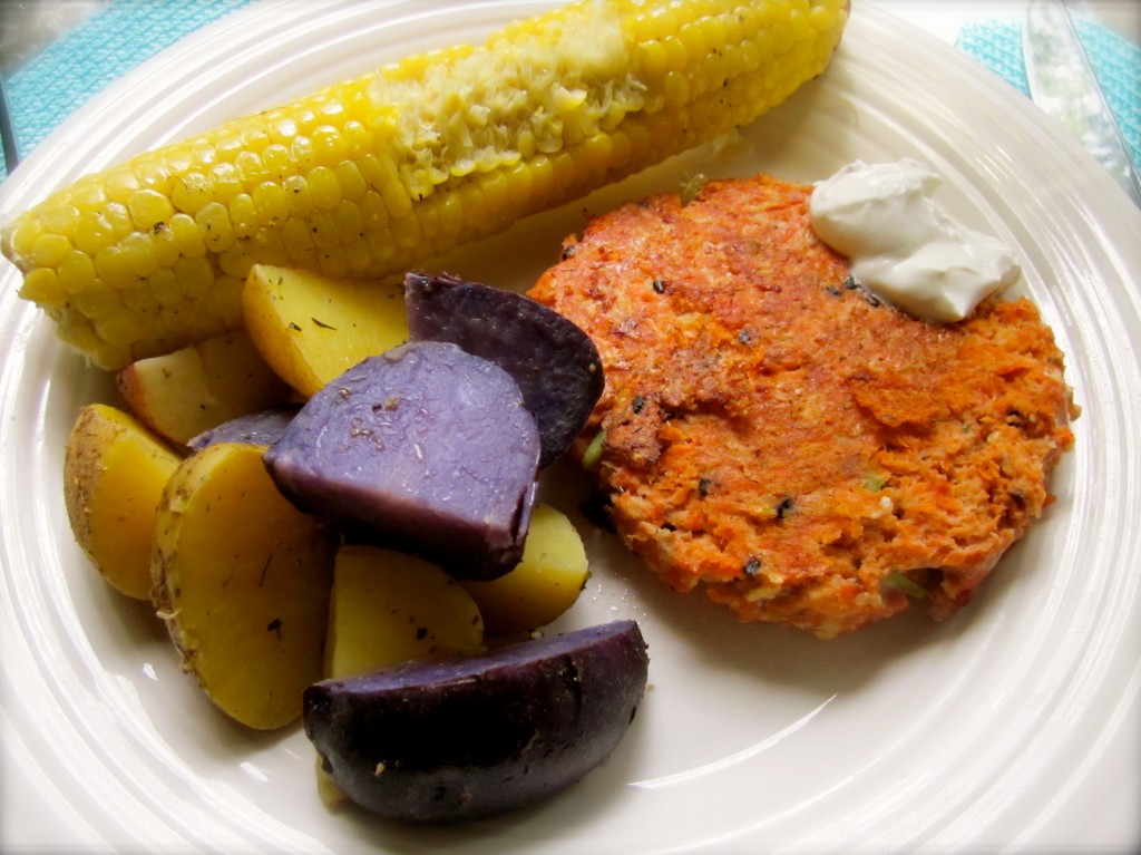 A delicious dinner: Boulecard Raspail Corn on the Cob, Dorie's Broth-Braised Potatoes and a salmon patty.