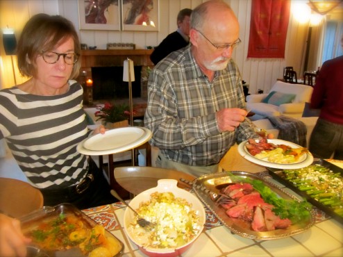 Cathy and Bernie are dishing up their chow.