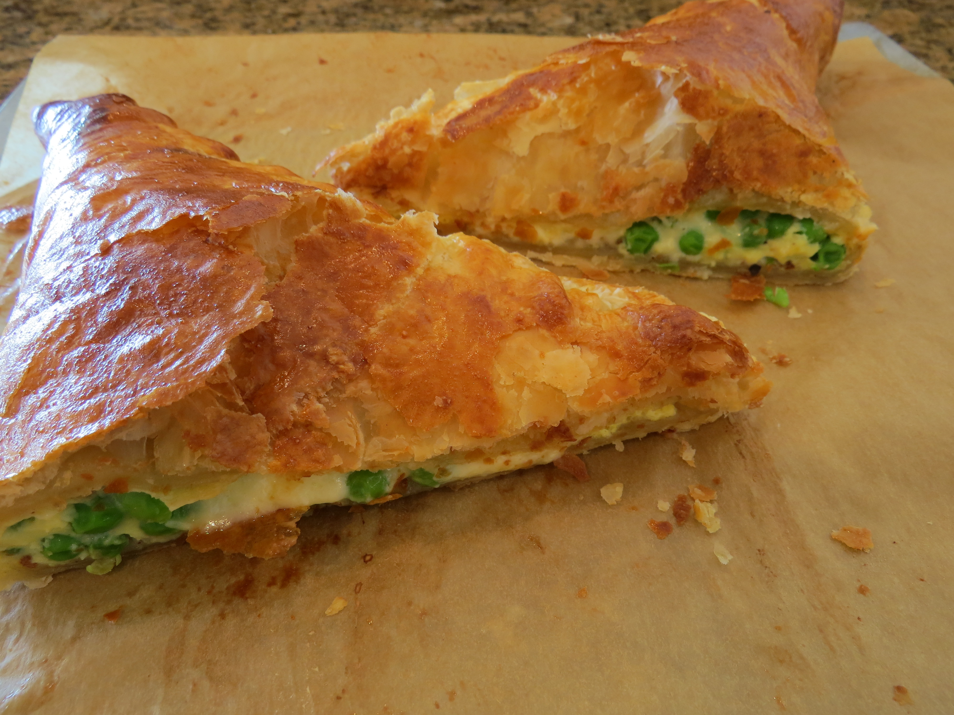 For your left over puff pastry, Cheesy Peesy Puff Turnover, filled with peas (fresh or frozen) and grated cheese. 