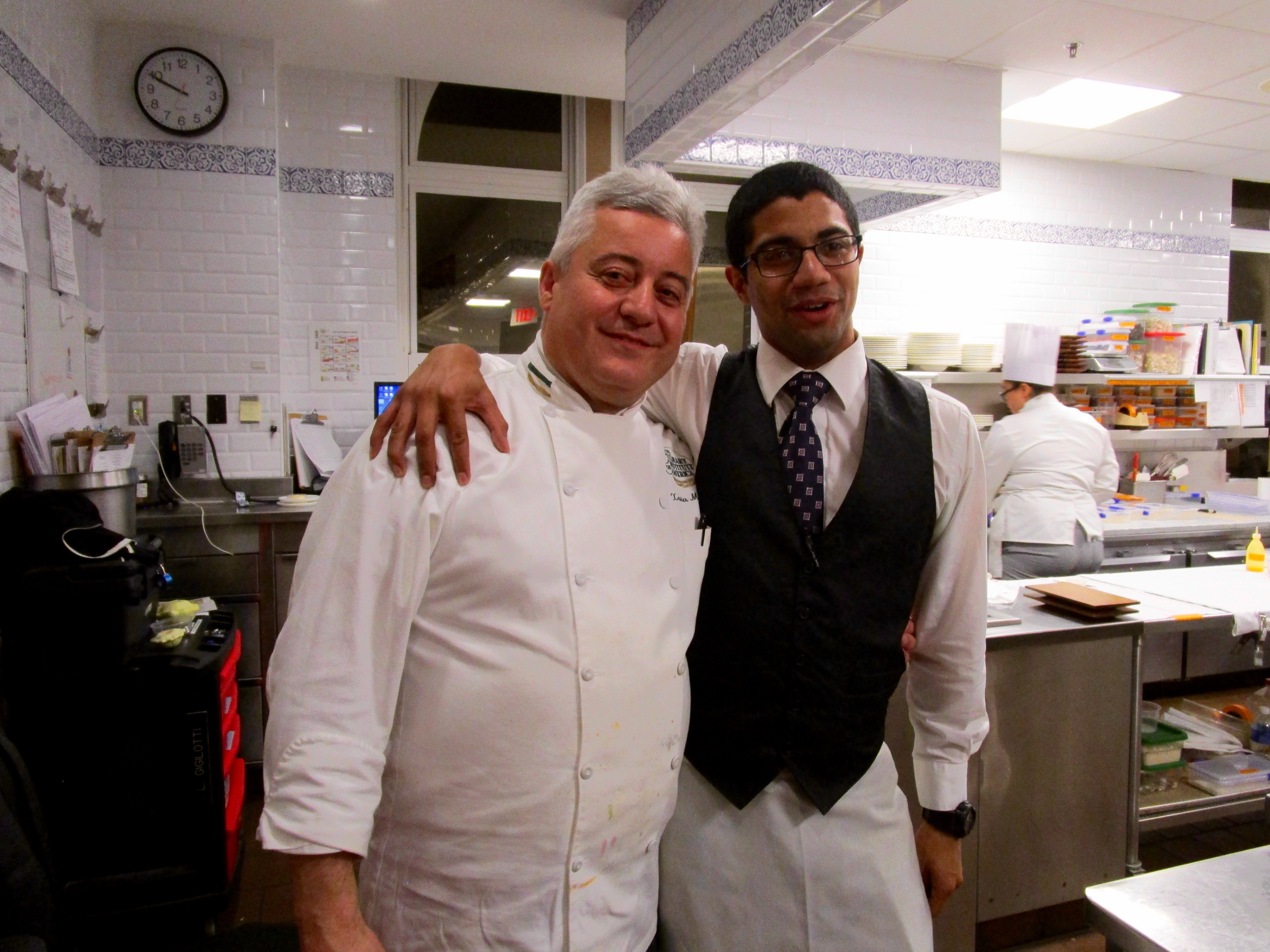 WE ALL WERE INVITED INTO THE KITCHEN FOR A TOUR (No, we didn't ask!).  THIS IS THE PROFESSOR CHEF AND OUR STUDENT WAITER. 
