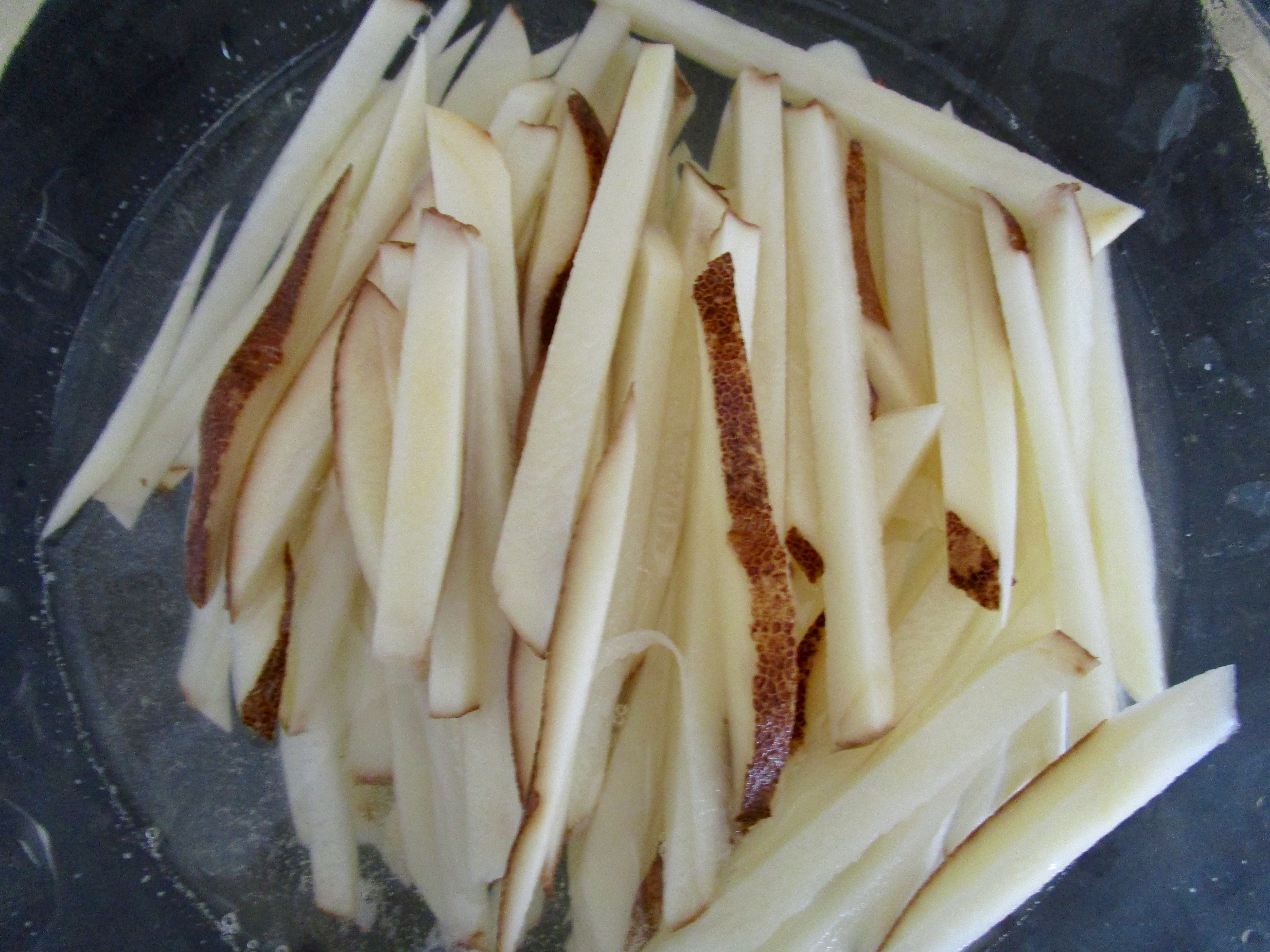 After cutting potatoes into 1/3 inch slices, cut each slice into  1/3-inch wide strips.