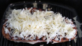 7. Scatter grated cheese on top and pop in the over to broil.