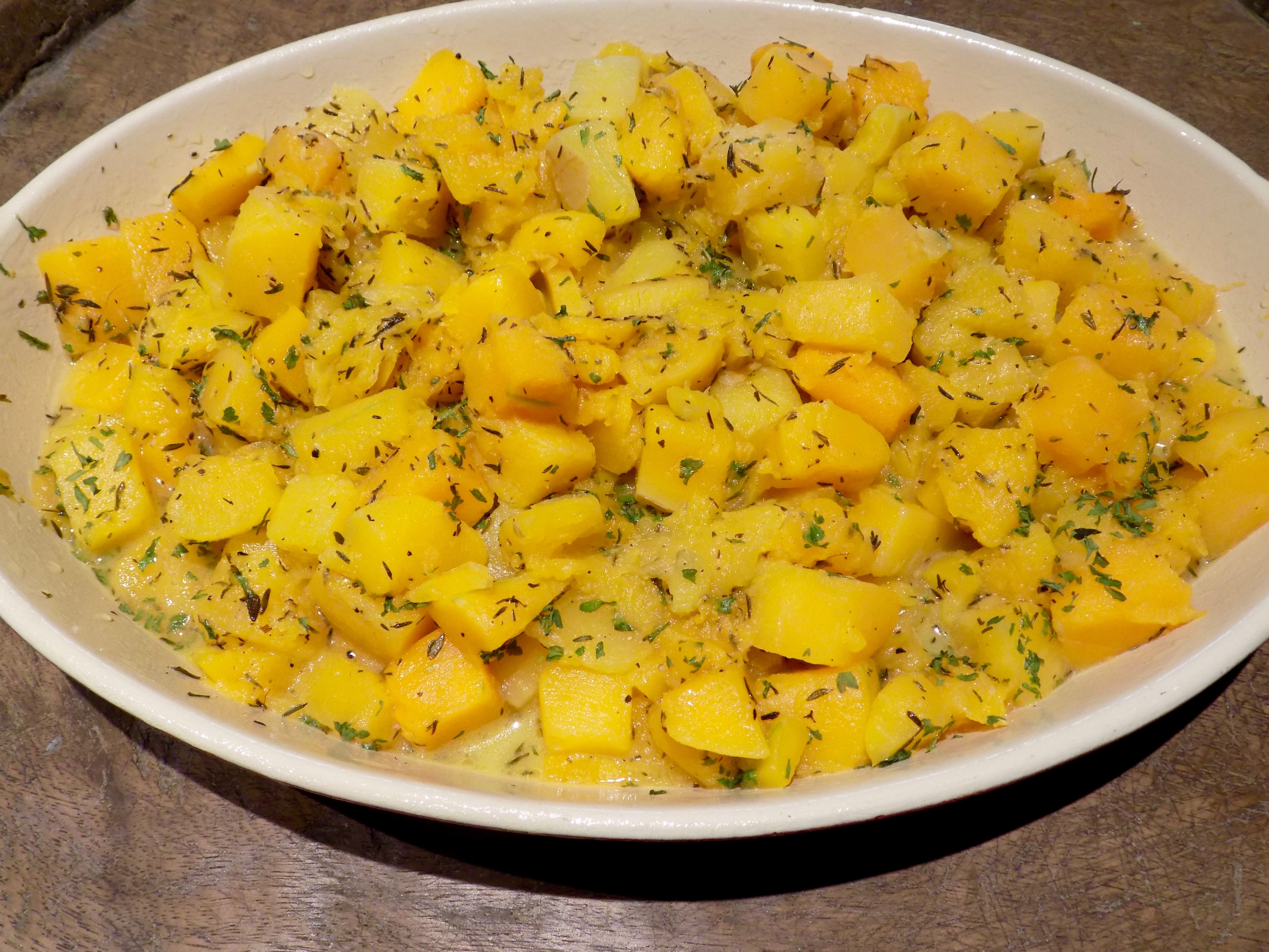 THE ROASTED SQUASH IS WAITING FOR ITS TOPPING MIXTURE.