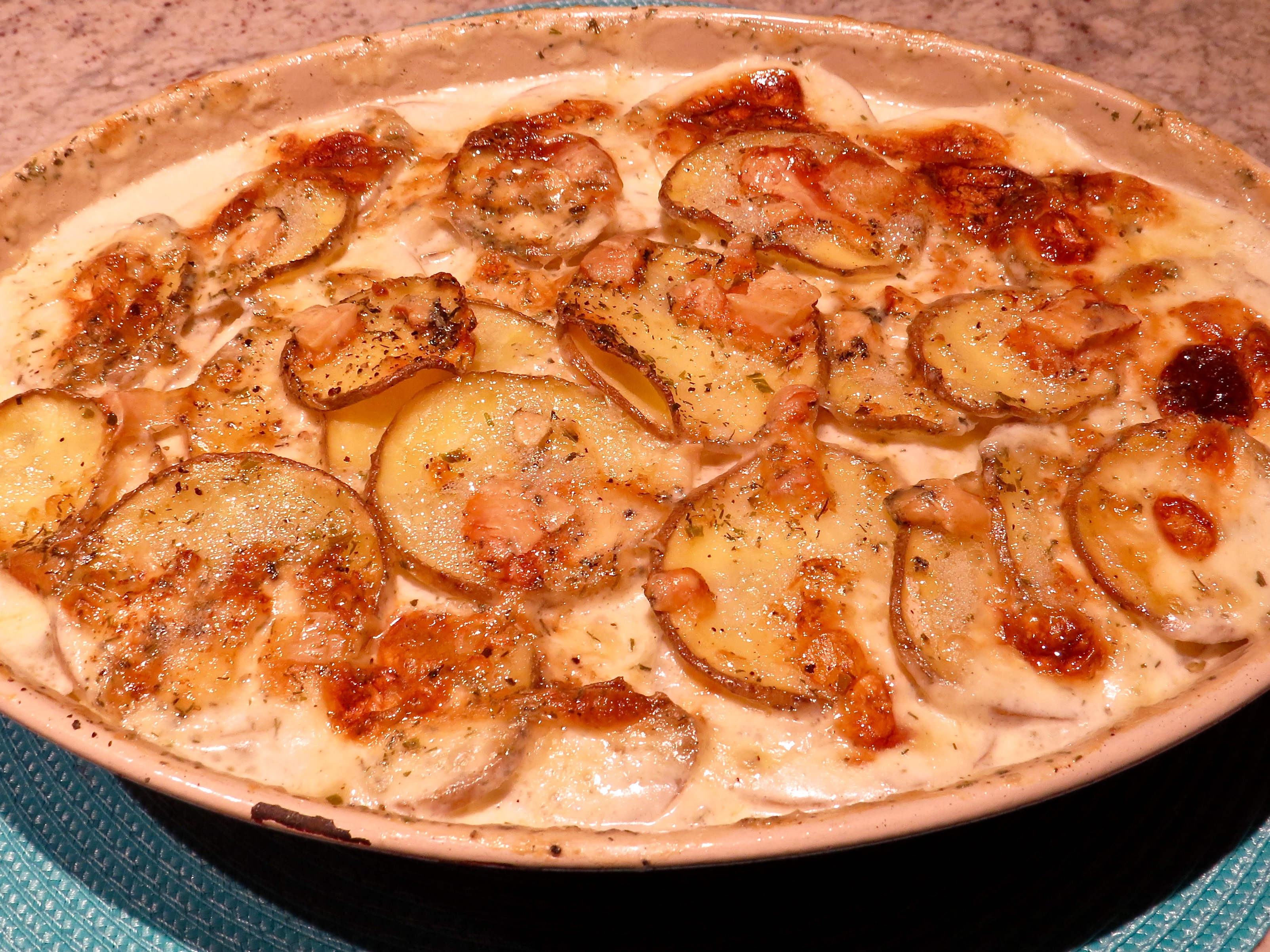 Recommended for Holidays - Scalloped Potatoes with Bleu Cheese and Roasted Garlic.